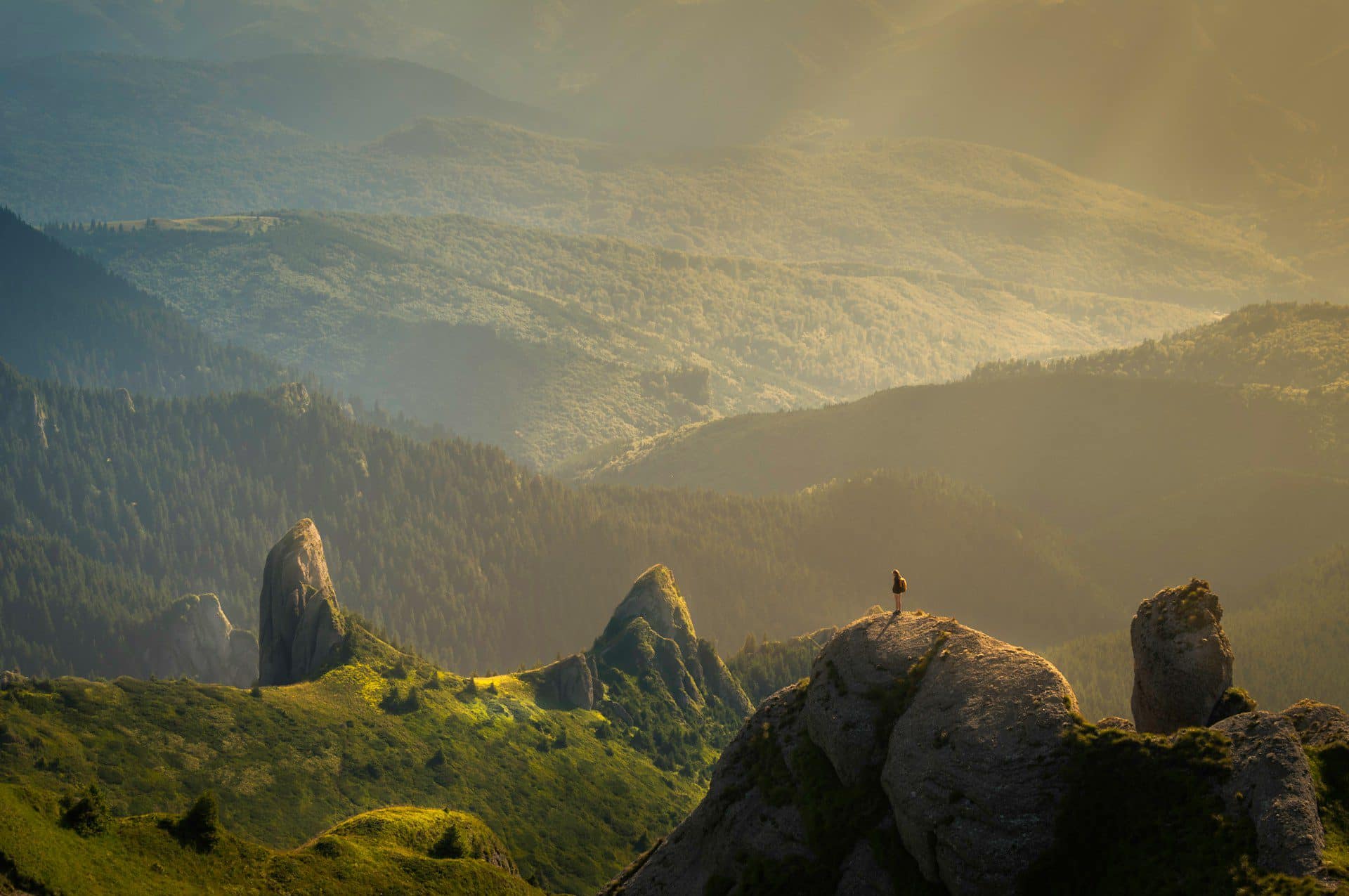 Sunlight breaking over a mountain landscape
