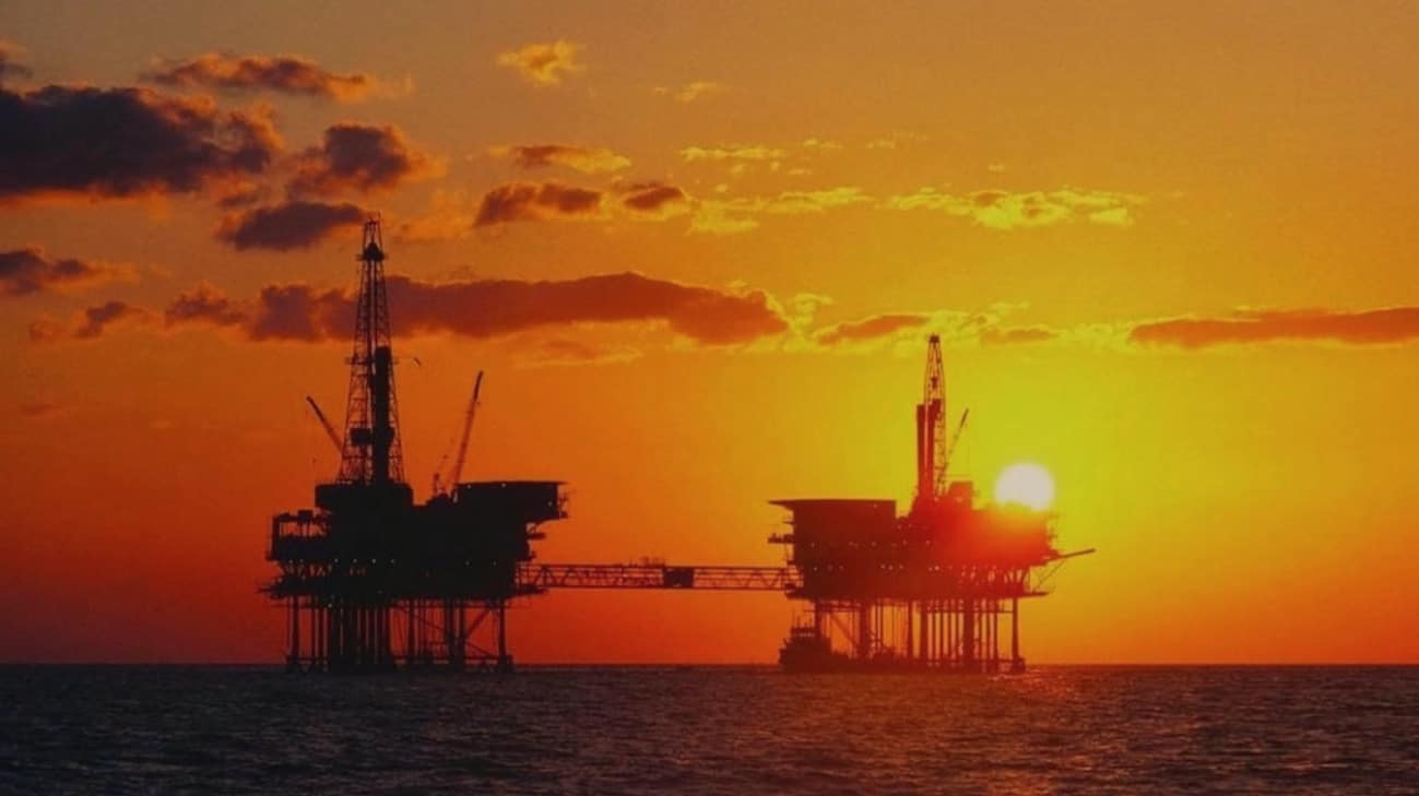 Offshore oil infrastructures at sunset