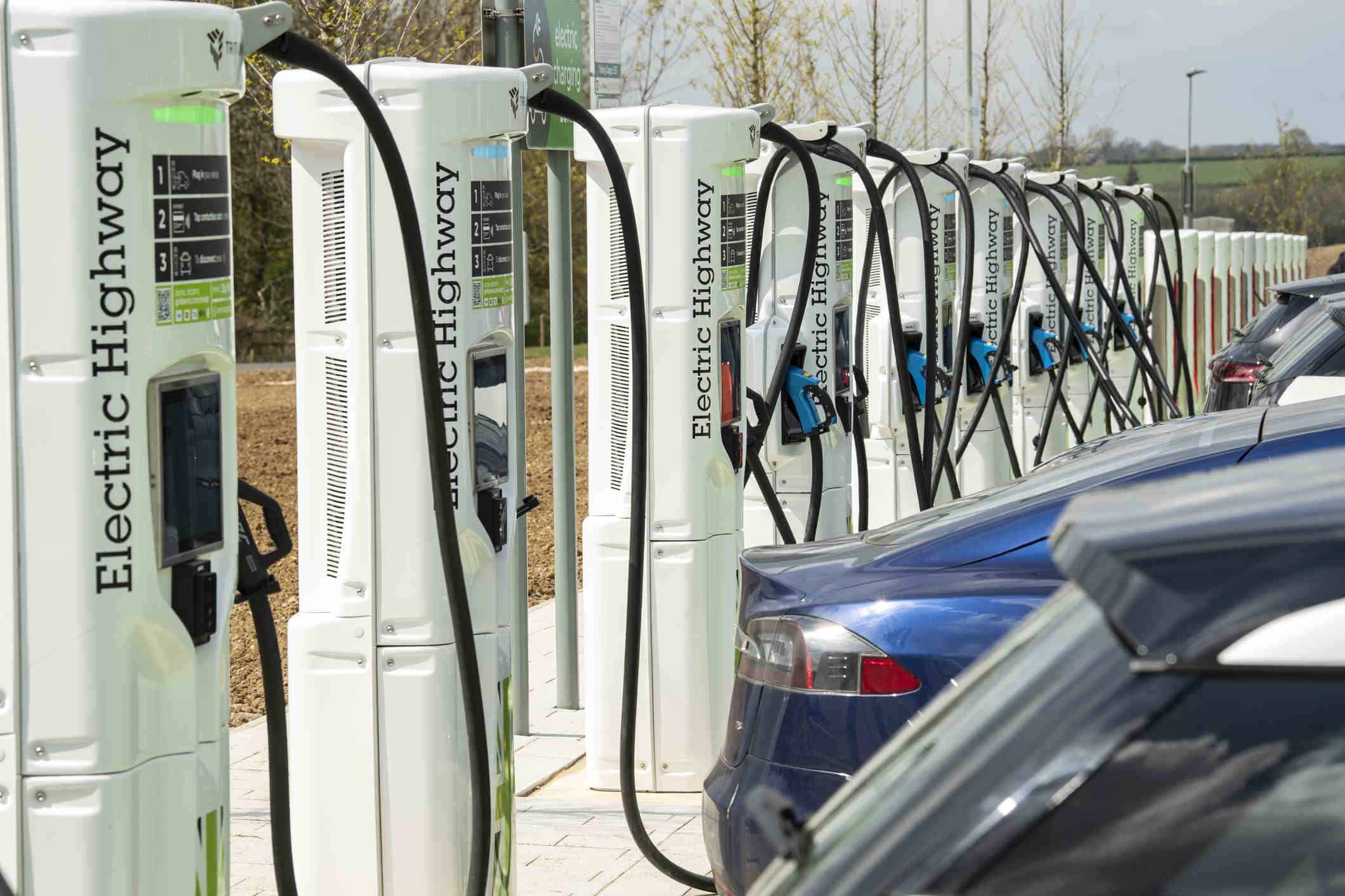 Row of electriv vehicle charging stations.